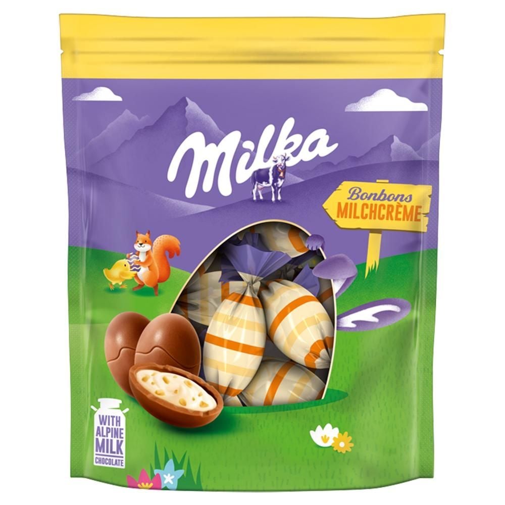 Milka Czekolada mleczna z nadzieniem mlecznym i kawałkami orzechów laskowych 86 g