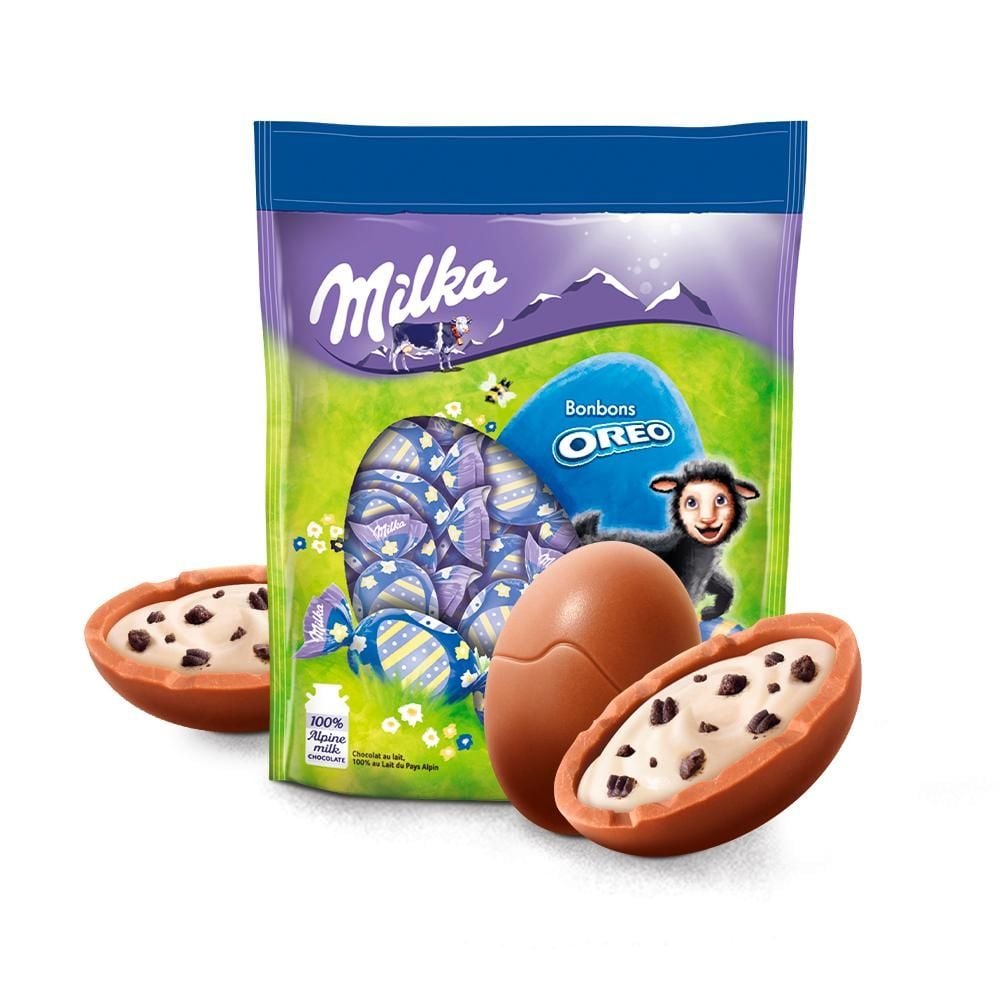 Milka Czekolada mleczna z nadzieniem mlecznym oraz pokruszone ciastka 86 g