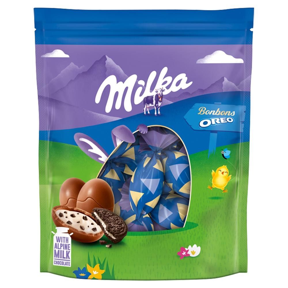 Milka Czekolada mleczna z nadzieniem mlecznym oraz pokruszone ciastka 86 g