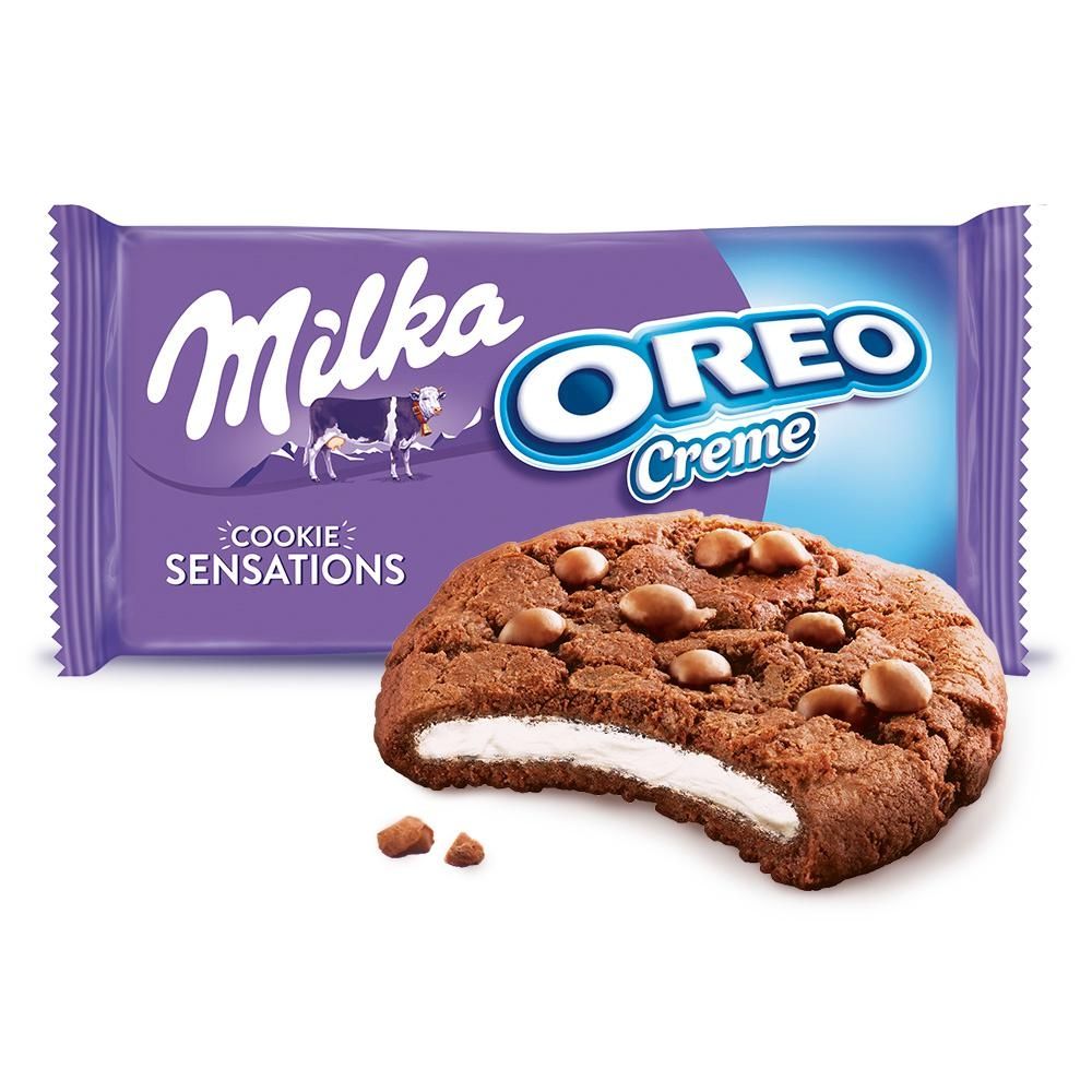 Milka Sensations Cookies Ciastka kakaowe z kawałkami czekolady i nadzieniem o smaku waniliowym 156 g